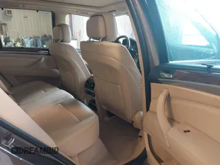 2013 BMW X5 xDrive35i z VIN 5UXZV4C54D0B21144, wystawiony jako IAAI lot #42304165 z przebiegiem 164 673 mil mil oraz . Historia ofert i sprzedaży dostępna na DreamBid. Obrazek 8.