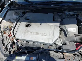 2012 Ford Fusion Hybrid with VIN 3FADP0L31CR380494, listed as a IAAI auction lot 40411832 with 81,452 mi miles and . Bid and sale history available at DreamBid. Image 10.