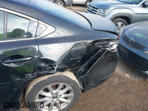 2015 Mazda 6 i Sport with VIN JM1GJ1U5XF1214570, listed as a IAAI auction lot 41003789 with 99,844 mi miles. Bid and sale history available at carsss.com. Image 6.