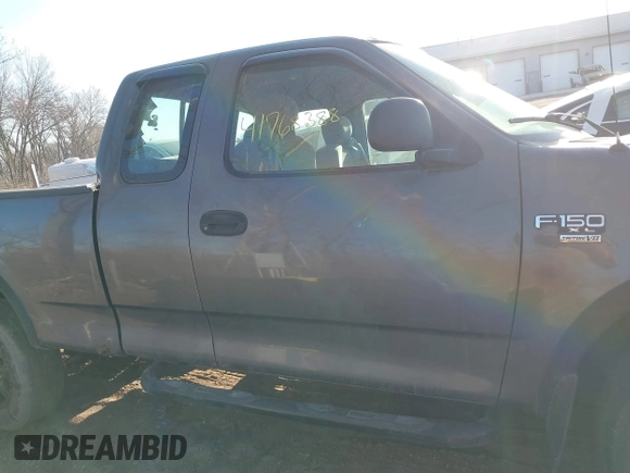2003 Ford F-150 XL with VIN 2FTRX18WX3CB01433, listed as a IAAI auction lot 41768388 with 170,357 mi miles. Bid and sale history available at carsss.com. Image 13.
