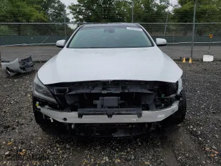 2017 Genesis G80 3.8L with VIN KMHGN4JE7HU177405, listed as a Copart auction lot 73409764 with 69,872 mi miles and Salvage Title. Bid and sale history available at carsss.com. Image 5.