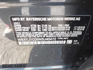 2022 BMW X2 xDrive28i with VIN WBXYJ1C05N5U40472, listed as a IAAI auction lot 41433452 with 67,801 mi miles. Bid and sale history available at carsss.com. Image 8.