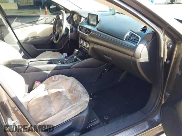 2016 Mazda 6 i Sport with VIN JM1GJ1U59G1402840, listed as a IAAI auction lot 41920724 with 147,527 mi miles and . Bid and sale history available at DreamBid. Image 5.