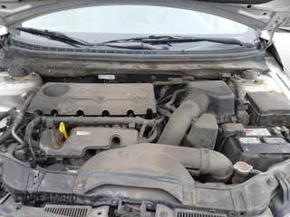 2013 Kia Forte LX with VIN KNAFT4A21D5739585, listed as a IAAI auction lot 42097213 with 195,500 mi miles. Bid and sale history available at carsss.com. Image 10.