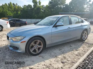 2015 BMW 3 Series 320i with VIN WBA3B1G52FNT02705, listed as a Copart auction lot 65730615 with 129,169 mi miles and Salvage title. Bid and sale history available at DreamBid. Image 1.