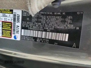 2012 Toyota Sienna z VIN 5TDKA3DCXCS010810, wystawiony jako Copart lot #54872735 z przebiegiem 188 973 mil mil oraz Szkoda całkowita • Salvage title. Historia ofert i sprzedaży dostępna na DreamBid. Obrazek 14.