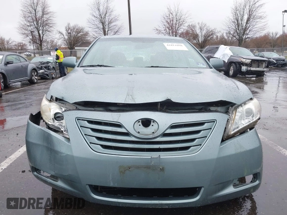 2007 Toyota Camry CE with VIN 4T1BE46K97U699024, listed as a IAAI auction lot 41811098 with 97,560 mi miles and . Bid and sale history available at DreamBid. Image 6.