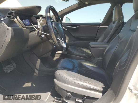 2014 Tesla Model S 60 with VIN 5YJSA1H19EFP58677, listed as a Copart auction lot 61446345 with 150,152 mi miles and Salvage title. Bid and sale history available at DreamBid. Image 7.