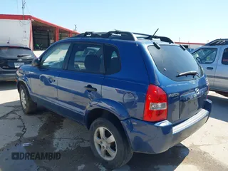 2006 Hyundai Tucson GL with VIN KM8JM12B06U386154, listed as a IAAI auction lot 41989899 with 168,069 mi miles. Bid and sale history available at carsss.com. Image 3.