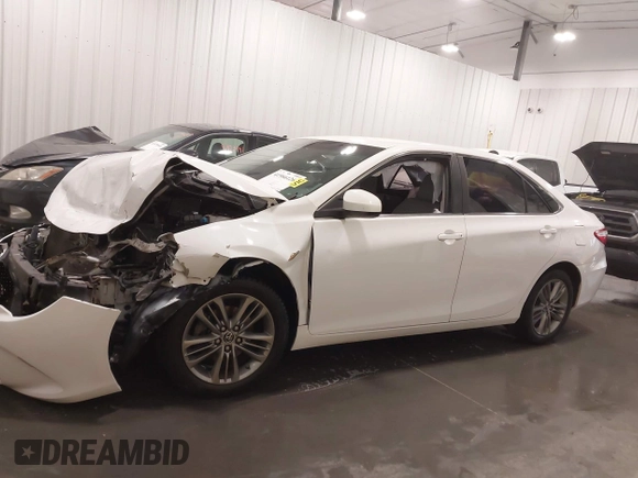2015 Toyota Camry XLE with VIN 4T1BF1FK0FU056717, listed as a IAAI auction lot 41966126 with 159,246 mi miles and . Bid and sale history available at DreamBid. Image 14.