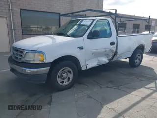 2000 Ford F-150 XL with VIN 1FTRF17WXYKA72880, listed as a IAAI auction lot 41989317 with 149,967 mi miles. Bid and sale history available at carsss.com. Image 18.