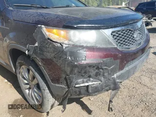 2011 Kia Sorento EX with VIN 5XYKU4A20BG001554, listed as a IAAI auction lot 41954009 with 119,323 mi miles. Bid and sale history available at carsss.com. Image 6.