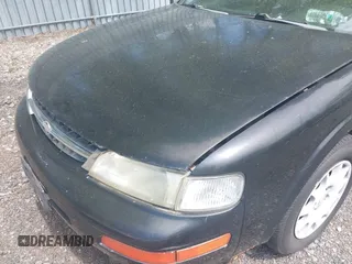 1998 Nissan Maxima GXE with VIN JN1CA21D2WM923835, listed as a IAAI auction lot 42221419 with 256,441 mi miles and . Bid and sale history available at DreamBid. Image 6.
