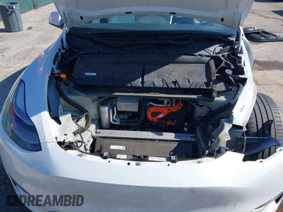 2021 Tesla Model Y Performance with VIN 5YJYGDEF8MF246658, listed as a IAAI auction lot 41679793 with 28,015 mi miles and . Bid and sale history available at DreamBid. Image 10.