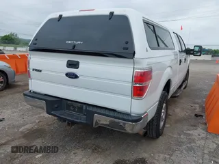 2014 Ford F-150 XL with VIN 1FTFW1ET8EFB33627, listed as a IAAI auction lot 42170252 with 173,886 mi miles. Bid and sale history available at carsss.com. Image 4.