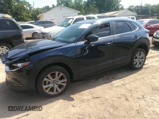 2022 Mazda CX-30 S Carbon Edition with VIN 3MVDMBCL6NM423255, listed as a IAAI auction lot 42209829 with 51,589 mi miles and . Bid and sale history available at DreamBid. Image 2.