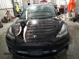 2023 Tesla Model 3 with VIN 5YJ3E1EA8PF451324, listed as a Copart auction lot 88318475 with 74,582 mi miles and Salvage Title. Bid and sale history available at DreamBid. Image 5.
