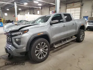 2023 GMC Canyon 4WD Denali with VIN 1GTP6FEK6P1232066, listed as a Copart auction lot 85235884 with 20,165 mi miles and Salvage Title. Bid and sale history available at carsss.com. Image 1.
