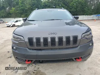 2022 Jeep Cherokee Trailhawk с VIN 1C4PJMBX1ND529146, выставлен на аукционе Copart как лот 56237365 с пробегом 26 718 миль миль и Списание • Salvage title. История ставок и продаж доступна на DreamBid. Изображение 5.