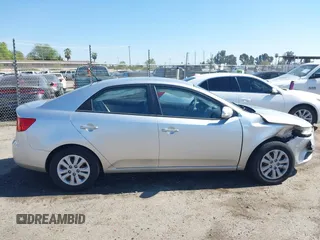 2010 Kia Forte EX with VIN KNAFU4A2XA5097831, listed as a IAAI auction lot 41872156 with 168,081 mi miles. Bid and sale history available at carsss.com. Image 13.