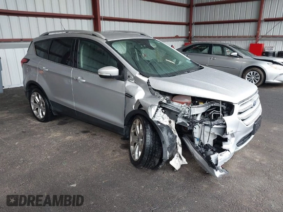 2019 Ford Escape Titanium with VIN 1FMCU9J9XKUA37695, listed as a IAAI auction lot 41868388 with 50,095 mi miles. Bid and sale history available at carsss.com. Image 1.