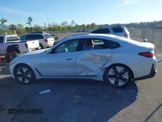 2024 BMW i4 eDrive35 z VIN WBY43AW04RFT05287, wystawiony jako IAAI lot #41427545 z przebiegiem 6 347 mil mil oraz . Historia ofert i sprzedaży dostępna na DreamBid. Obrazek 15.