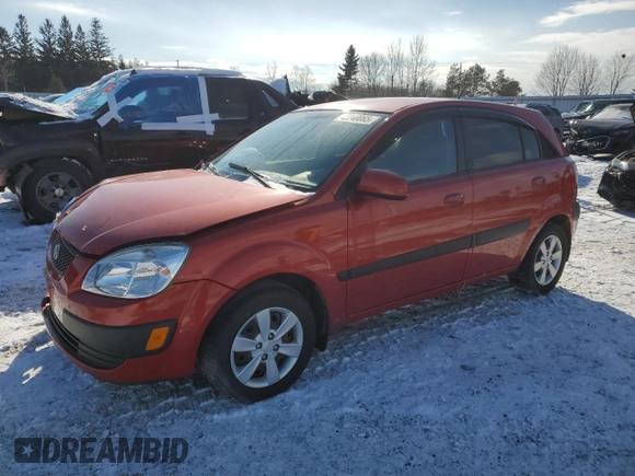 2009 Kia Rio LX with VIN KNADE243596567394, listed as a Copart auction lot 42240065 with 160,044 mi miles and Salvage Title. Bid and sale history available at carsss.com. Image 1.