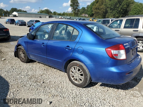 2012 Suzuki SX4 LE with VIN JS2YC5A31C6303361, listed as a Copart auction lot 74329394 with 136,420 mi miles and Salvage Title. Bid and sale history available at carsss.com. Image 2.