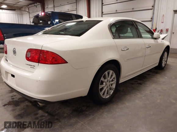 2011 Buick Lucerne CXL with VIN 1G4HC5EM1BU151570, listed as a IAAI auction lot 41815302 with 142,803 mi miles and . Bid and sale history available at DreamBid. Image 4.