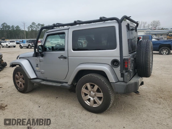 2015 Jeep Wrangler Sahara with VIN 1C4AJWBG8FL651169, listed as a Copart auction lot 44468995 with 119,419 mi miles and Salvage title. Bid and sale history available at DreamBid. Image 2.