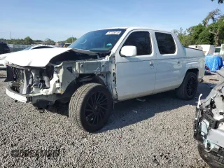 2007 Honda Ridgeline RTL z VIN 2HJYK16567H531498, wystawiony jako Copart lot #57128015 z przebiegiem 217 297 mil mil oraz Szkody całkowita. Historia ofert i sprzedaży dostępna na DreamBid. Obrazek 1.