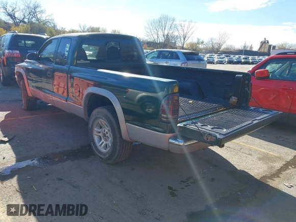1998 Dodge Dakota SLT with VIN 1B7GG22X3WS573262, listed as a IAAI auction lot 40905093 with 148,684 mi miles and . Bid and sale history available at DreamBid. Image 3.