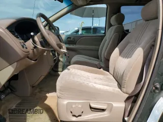 2001 Toyota Sienna LE z VIN 4T3ZF13C61U348612, wystawiony jako Copart lot #58386875 z przebiegiem 142 313 mil mil oraz Tytuł czysty. Historia ofert i sprzedaży dostępna na DreamBid. Obrazek 8.