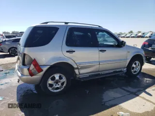 2000 Mercedes-Benz M 320/430/500 with VIN 4JGAB54E7YA151114, listed as a Copart auction lot 50175395 with 166,093 mi miles and Salvage Title. Bid and sale history available at DreamBid. Image 3.