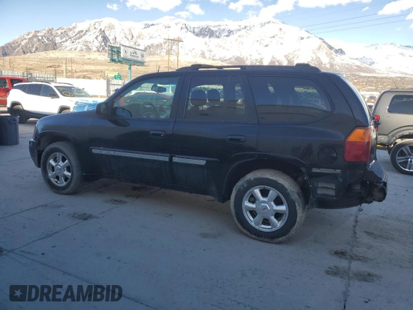 2005 GMC Envoy SLE with VIN 1GKDT13S452285975, listed as a Copart auction lot 46371785 with 358,411 mi miles and Salvage Title. Bid and sale history available at carsss.com. Image 2.
