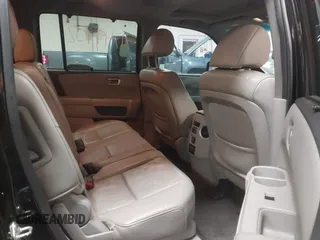 2012 Honda Pilot Touring with VIN 5FNYF4H91CB067014, listed as a IAAI auction lot 41749402 with 151,248 mi miles. Bid and sale history available at carsss.com. Image 8.