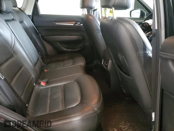 2018 Mazda CX-5 Grand Touring with VIN JM3KFBDM4J0412835, listed as a Copart auction lot 55441315 with 191,968 mi miles and Salvage title. Bid and sale history available at DreamBid. Image 10.