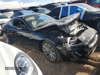 2011 Jaguar XK with VIN SAJWA4FB3BLB39648, listed as a Copart auction lot 80333604 with 0 mi miles and Salvage Title. Bid and sale history available at carsss.com. Image 4.