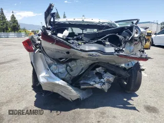 2021 Toyota Prius LE z VIN JTDKAMFPXM3169514, wystawiony jako Copart lot #63255095 z przebiegiem 49 546 mil mil oraz Szkoda całkowita • Salvage title. Historia ofert i sprzedaży dostępna na DreamBid. Obrazek 6.