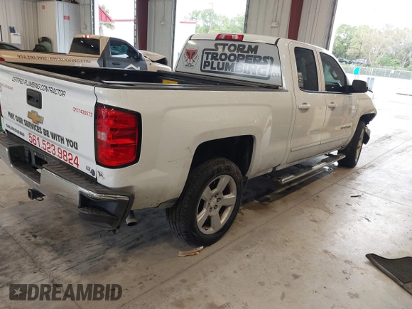 2018 Chevrolet Silverado 1500 LT with VIN 1GCRCREC0JZ204834, listed as a IAAI auction lot 41363579 with 135,247 mi miles and . Bid and sale history available at DreamBid. Image 4.