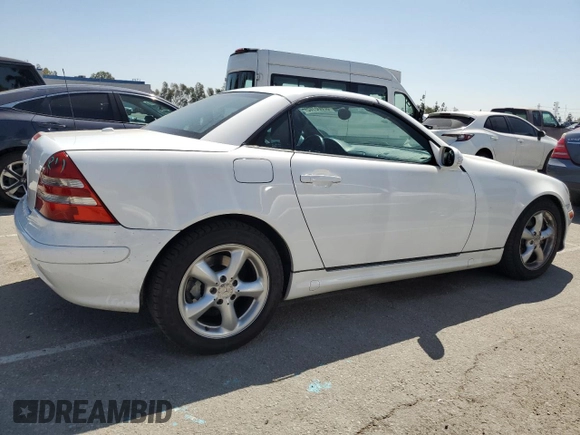 2001 Mercedes-Benz SLK-Class with VIN WDBKK65F81F210099, listed as a Copart auction lot 52606105 with 129,849 mi miles and Salvage Title. Bid and sale history available at carsss.com. Image 3.