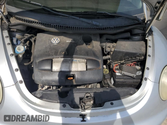 2003 Volkswagen Beetle GLS z VIN 3VWCK21Y33M326199, wystawiony jako Copart lot #54796685 z przebiegiem 142 574 mil mil oraz Szkoda całkowita • Salvage title. Historia ofert i sprzedaży dostępna na DreamBid. Obrazek 11.