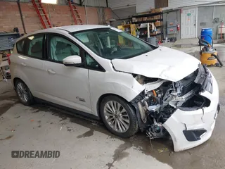 2017 Ford C-Max SE z VIN 1FADP5EU2HL106844, wystawiony jako IAAI lot #42064122 z przebiegiem 86 850 mil mil oraz . Historia ofert i sprzedaży dostępna na DreamBid. Obrazek 1.