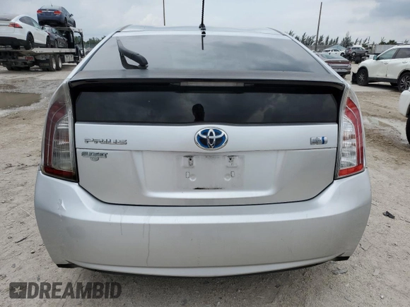 2013 Toyota Prius One z VIN JTDKN3DU4D5607682, wystawiony jako Copart lot #59471765 z przebiegiem 143 690 mil mil oraz Czysty tytuł • Clean title. Historia ofert i sprzedaży dostępna na DreamBid. Obrazek 6.