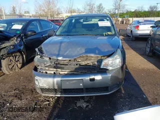 2008 Ford Focus SE with VIN 1FAHP35N98W165970, listed as a IAAI auction lot 42028598 with 242,004 mi miles and . Bid and sale history available at carsss.com. Image 12.
