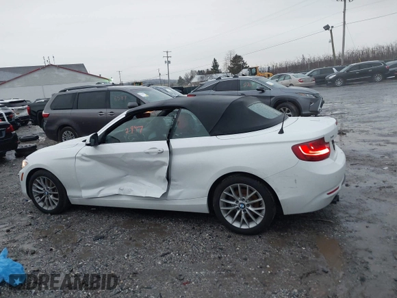 2016 BMW 2 Series 228i xDrive with VIN WBA1L9C59GV767802, listed as a IAAI auction lot 41132997 with 87,674 mi miles. Bid and sale history available at carsss.com. Image 13.