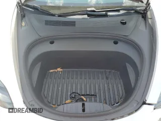 2021 Tesla Model 3 Standard Range Plus z VIN 5YJ3E1EA1MF064335, wystawiony jako Copart lot #57133955 z przebiegiem 60 024 mil mil oraz Szkody całkowita. Historia ofert i sprzedaży dostępna na DreamBid. Obrazek 11.