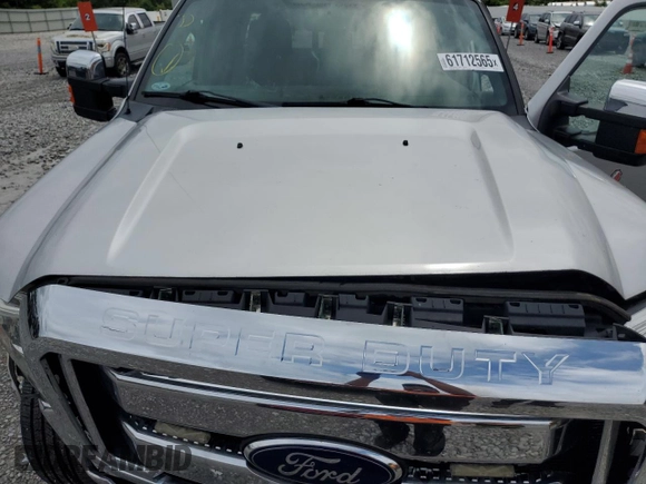 2014 Ford F-250 XL with VIN 1FT7X2B67EEA13796, listed as a Copart auction lot 61712565 with 130,090 mi miles and Salvage title. Bid and sale history available at DreamBid. Image 11.