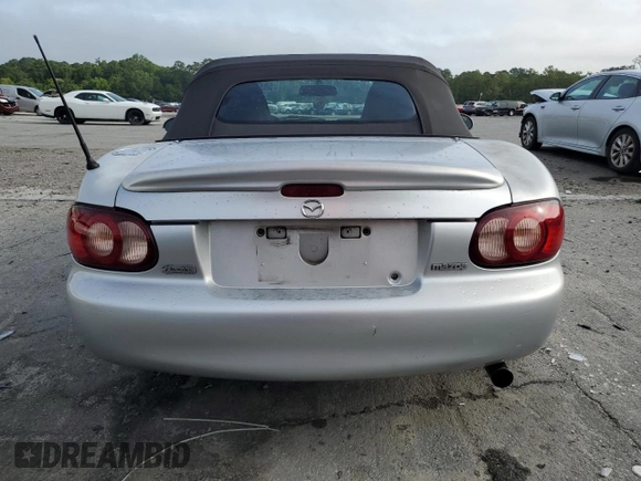 2003 Mazda MX-5 Miata Cloth z VIN JM1NB353630305964, wystawiony jako Copart lot #58517505 z przebiegiem 129 675 mil mil oraz Szkoda całkowita • Salvage title. Historia ofert i sprzedaży dostępna na DreamBid. Obrazek 6.