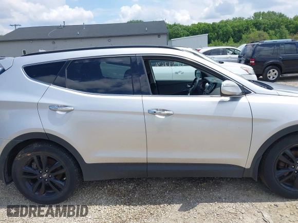 2013 Hyundai Santa Fe Sport z VIN 5XYZUDLA8DG055576, wystawiony jako IAAI lot #42392636 z przebiegiem 165 096 mil mil oraz . Historia ofert i sprzedaży dostępna na DreamBid. Obrazek 13.
